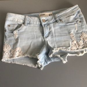 Ripped denim shorts